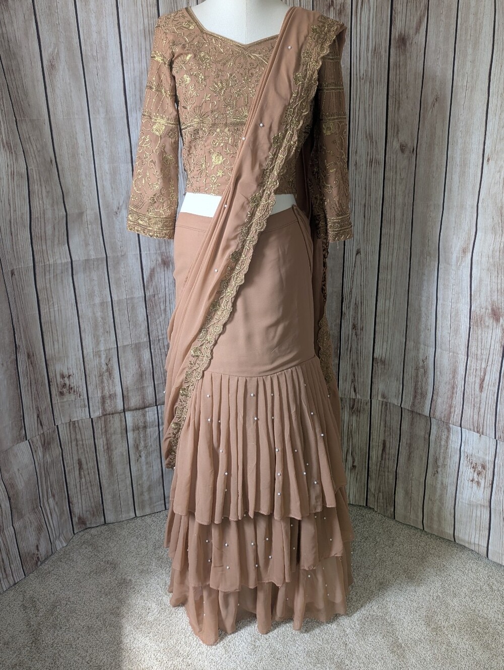 Embroidered Peach-Tan Layered Lehenga Skirt with Gold Accents